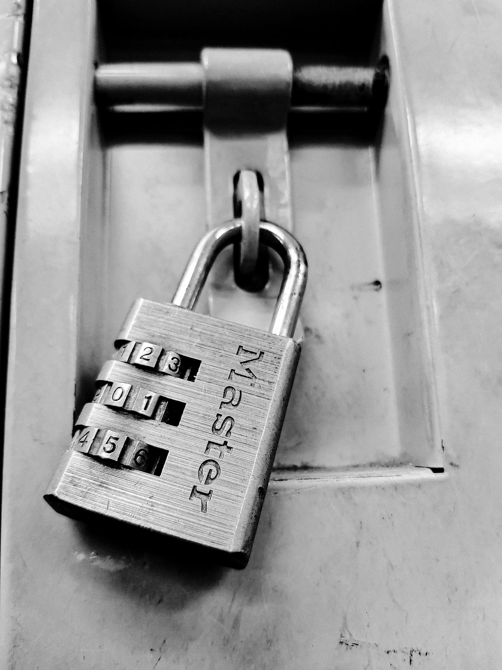 A combination padlock illustrating privacy and account-access controls